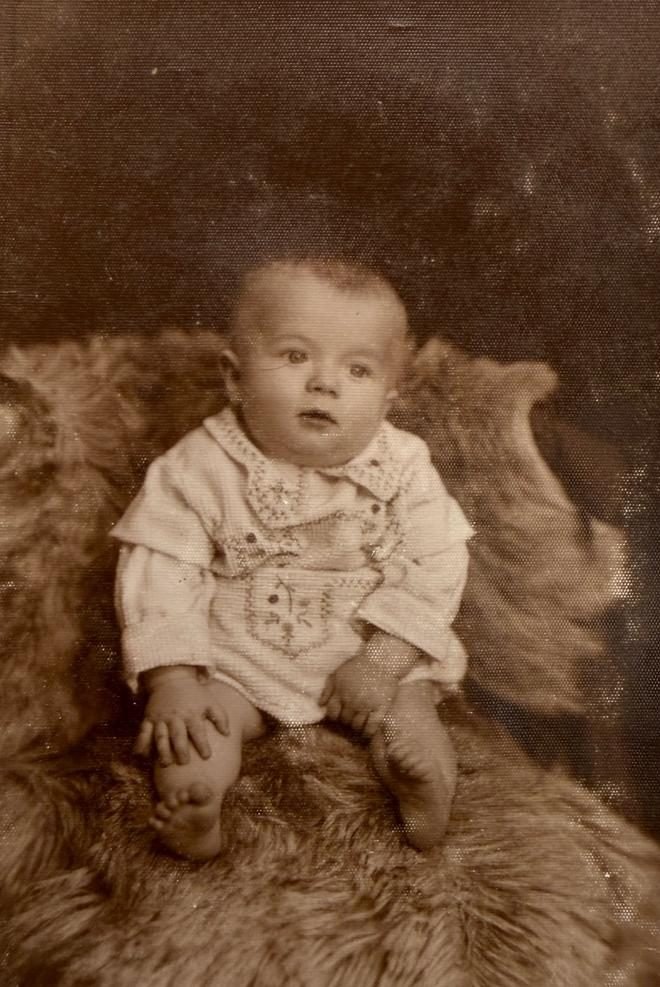 Tadeusz — a studio photograph with the date 9 February 1936 written on the print; he is seven months old here. From a private collection.